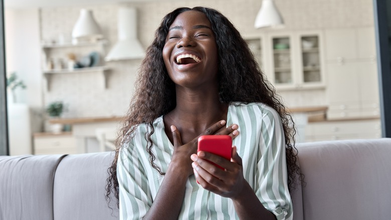 Woman excited on the phone