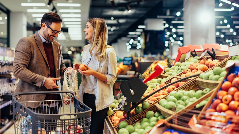 Couple shopping for healthy food together