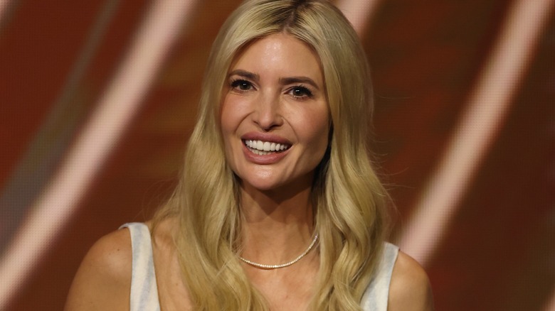 Ivanka Trump smiling while wearing white