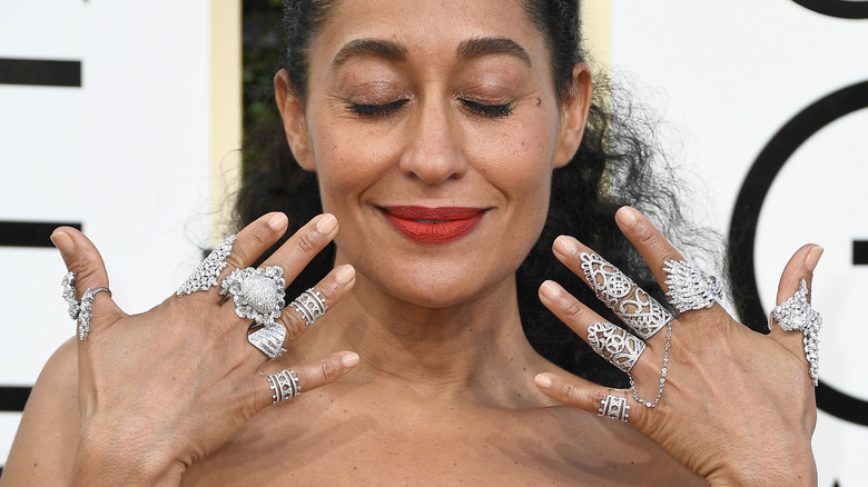 Tracee Ellis Ross with stacked rings 