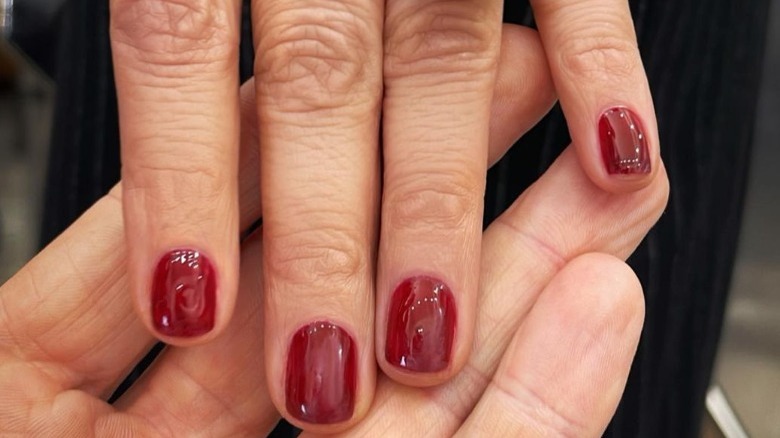 red nail polish manicure