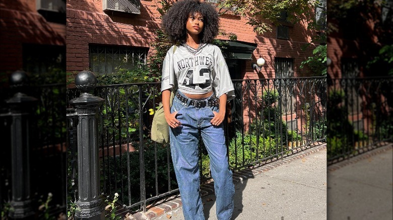 A woman wearing baggy jeans