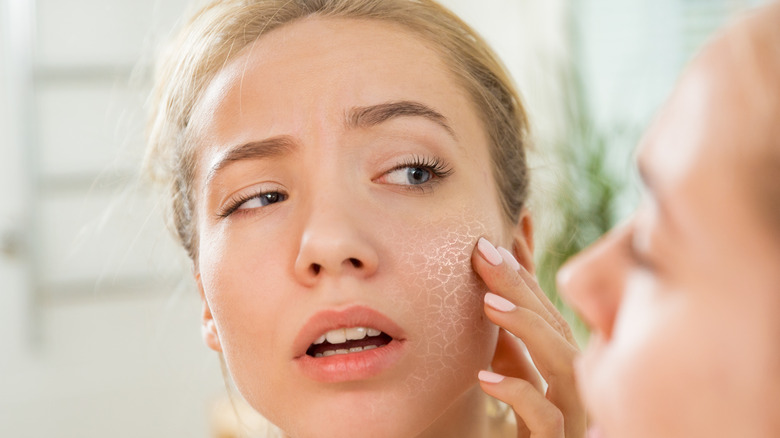 woman drying skin face