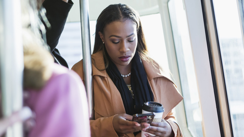 sad woman texting 