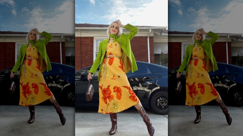 woman wearing lime green jacket over yellow floral dress