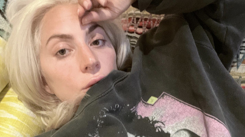 Lady Gaga without makeup laying down