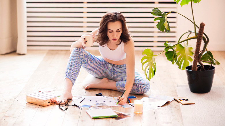 woman creating vision board