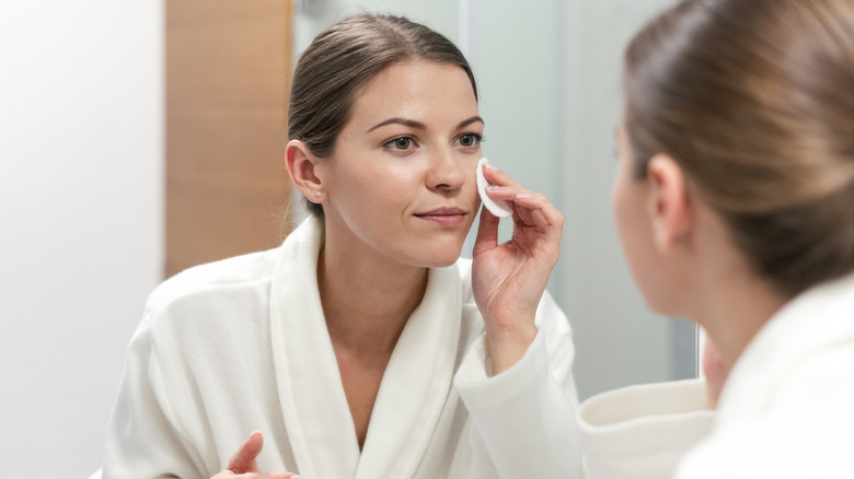 woman treating skin