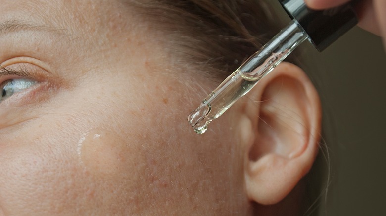 woman treating her skin