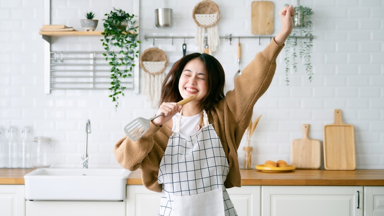 happy woman in kitchen