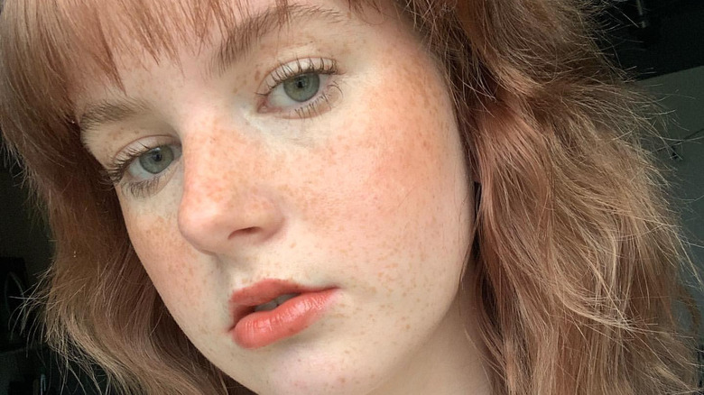 Woman wearing sunburn style blush