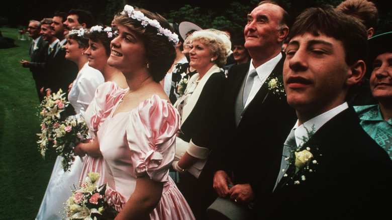 '80s bridesmaid wearing a pink dress 