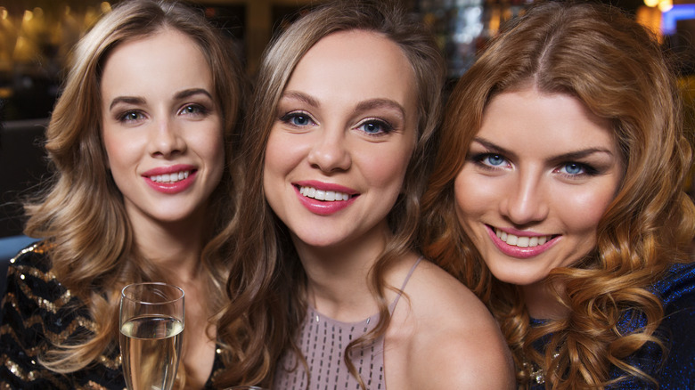 3 young women partying 