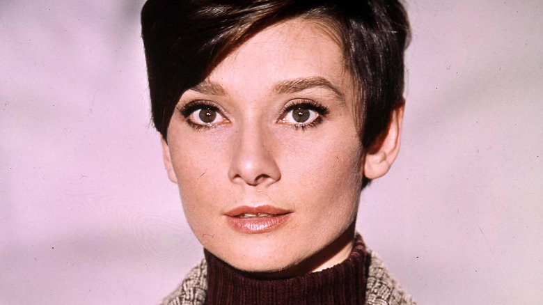 Audrey Hepburn posing with natural eyebrows