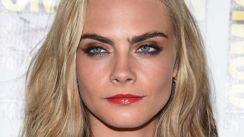 Cara Delevingne showing off her bold eyebrows