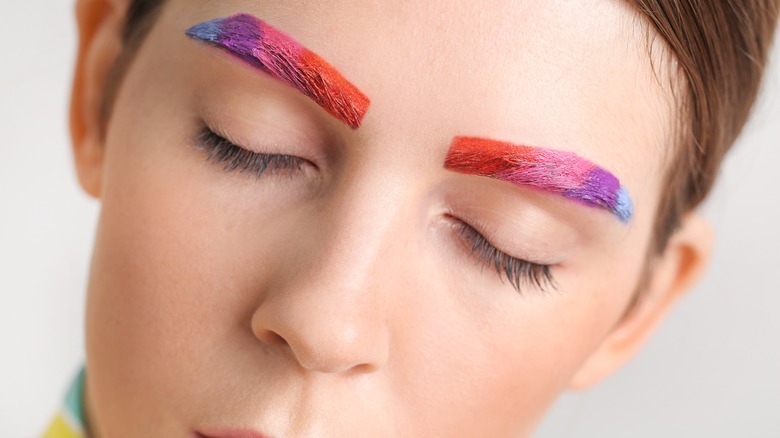 Bold rainbow-colored eyebrows