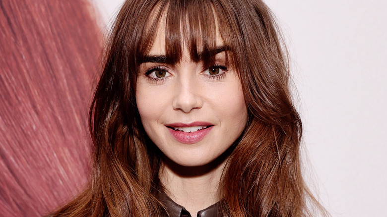 Actor Lily Collins showing off bold, dark brows