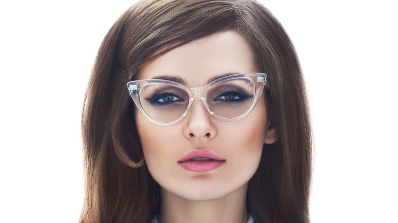 woman wearing butterfly glasses