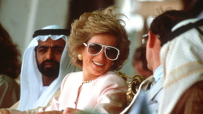 Princess Diana wearing white sunglasses 