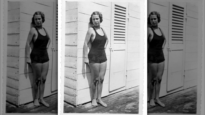 Woman wearing a 30s one-piece swimsuit