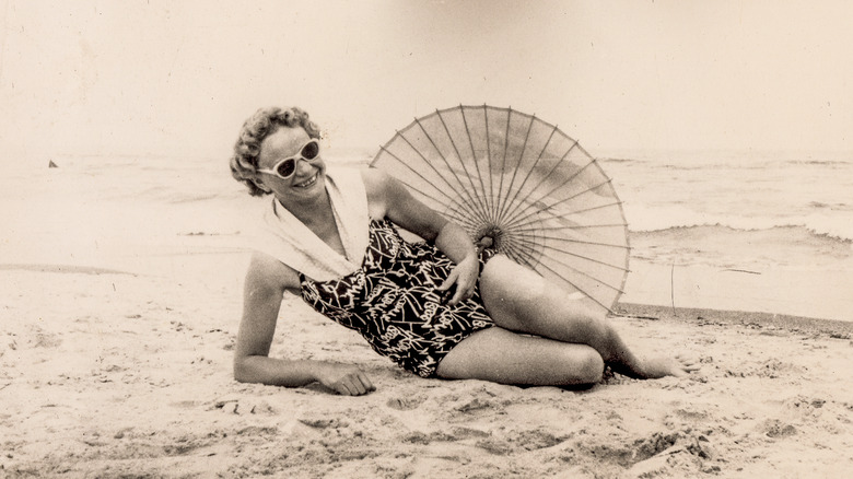 Woman at the beach in the 60s