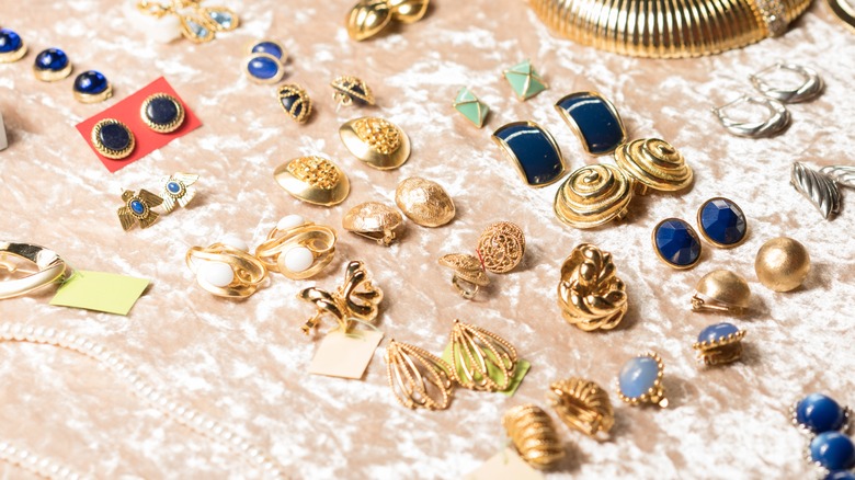 A table of vintage earrings