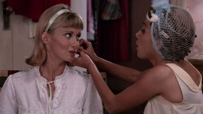 Pierced ears scene from Grease