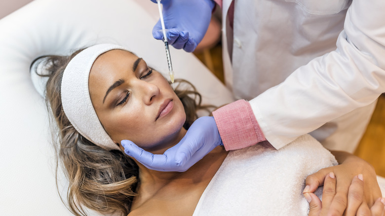 woman receiving injectables 