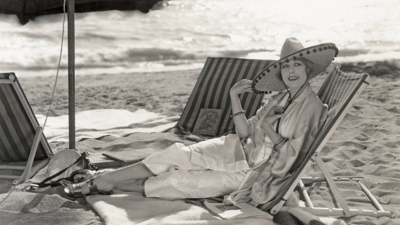 A 1920s woman enjoying the beach