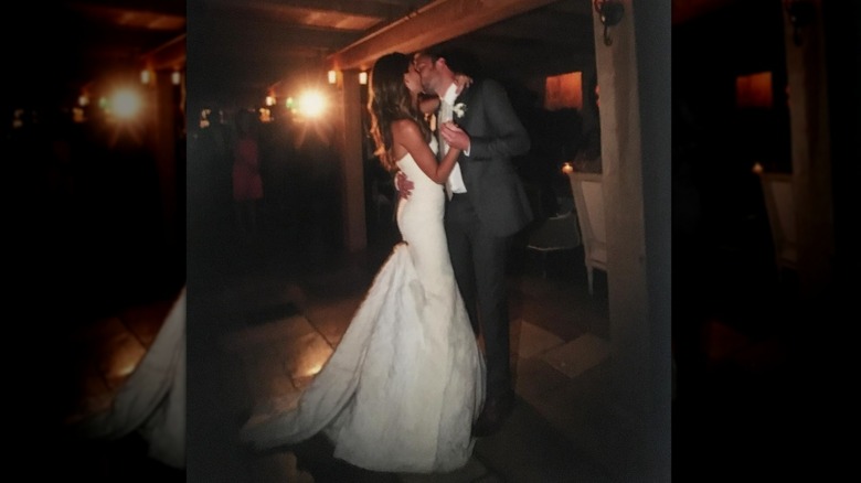 Lily Aldridge dancing in a white dress on her wedding day