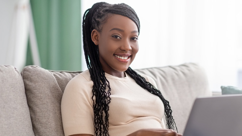 Smiling woman with braided hair