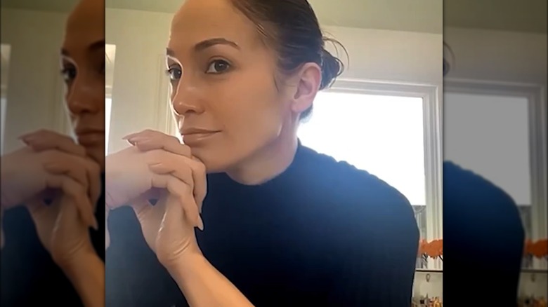 Jennifer Lopez black top bun