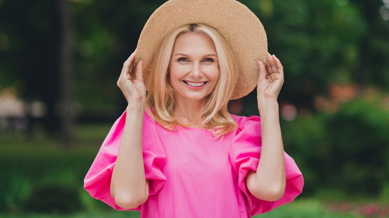 Blond hair woman wearing hat