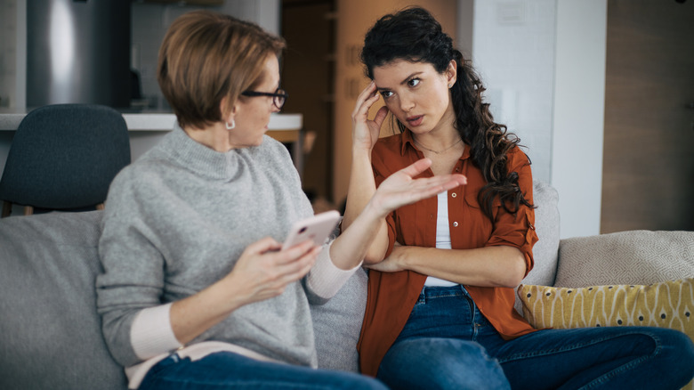 people talking on couch