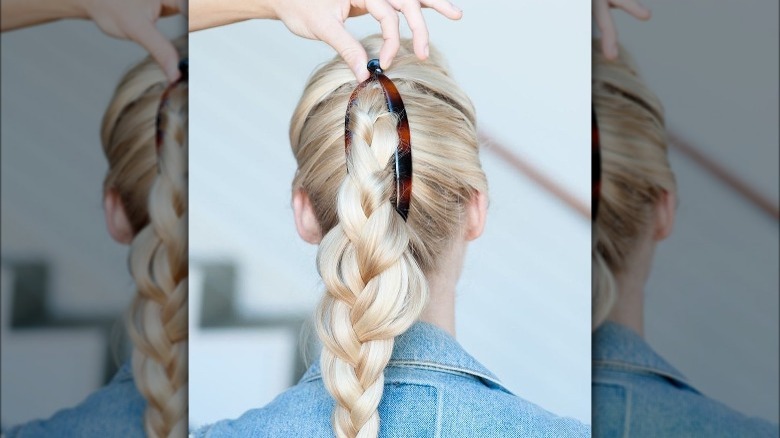 Person wearing braids and clips