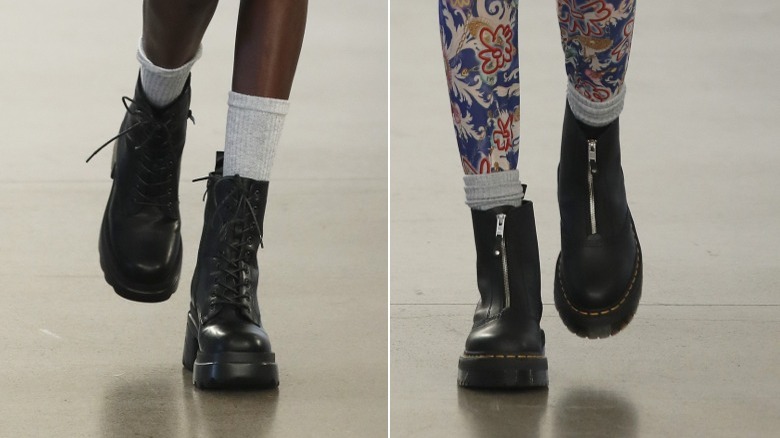 Two models wearing different combat boots