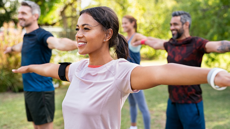 woman in exercise class outside