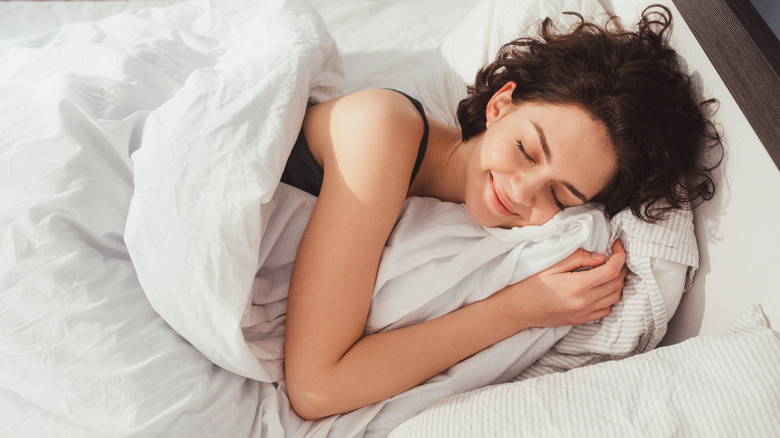 woman sleeping in bed