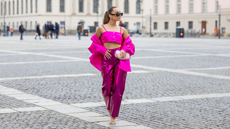 Woman wearing hot pink clothing