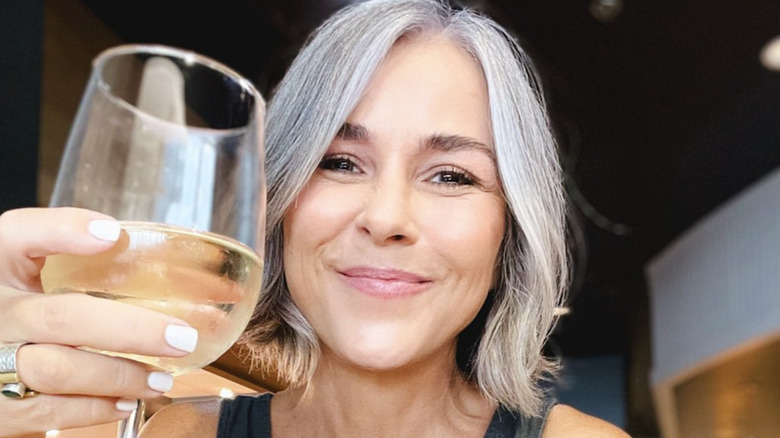 A woman with a gray bob haircut