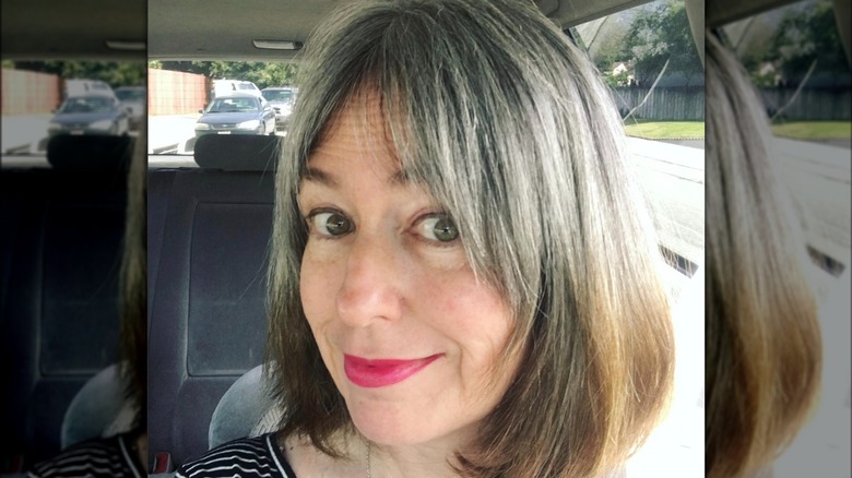 A woman with a gray bob haircut