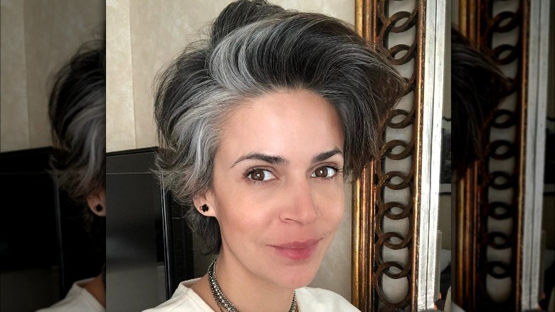 Woman with voluminous gray hair