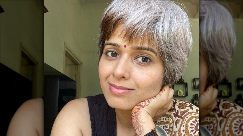 A woman with short gray hair