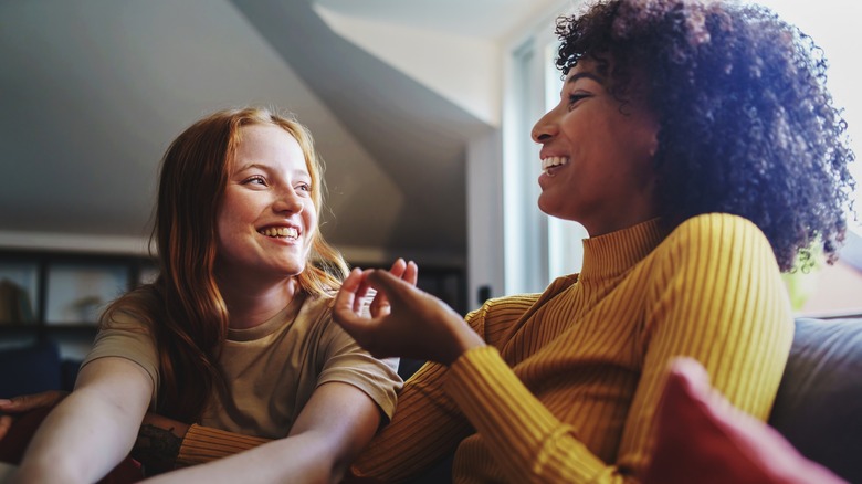 couple smiling and talking