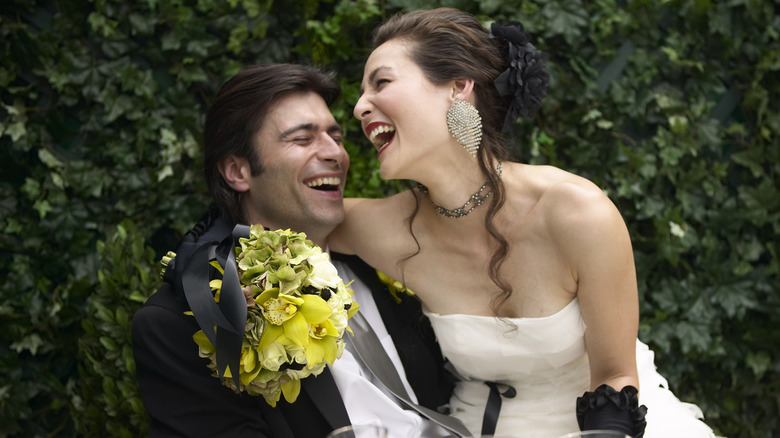 wedding couple laughing