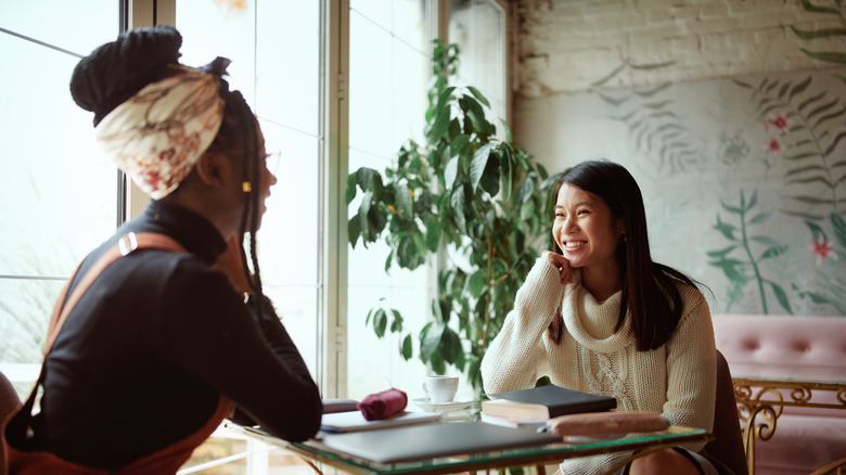 Women talking over coffee