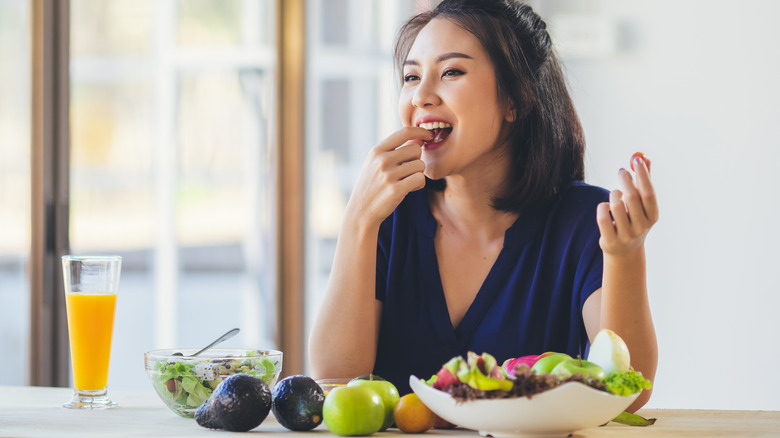 Woman eating healthy foods