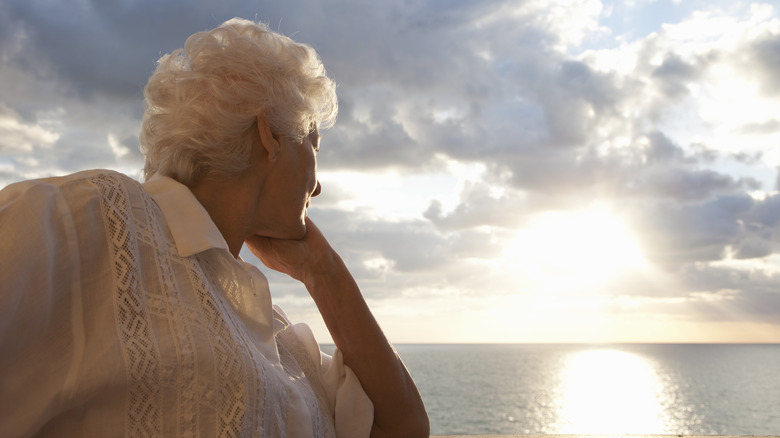 Woman watching sunrise 