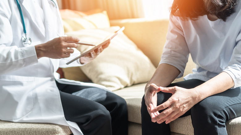 Woman meeting with doctor