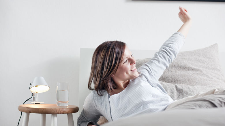 woman waking up in bed